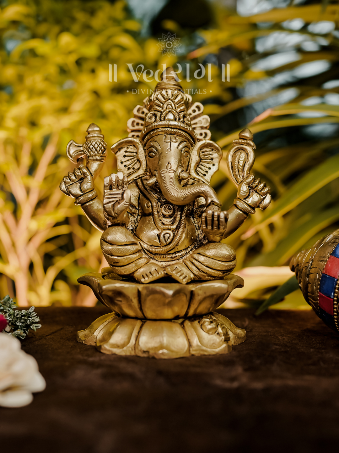 YELLOW BRASS GANPATI B EAR IDOL 1.2X0.5X1  DL1026